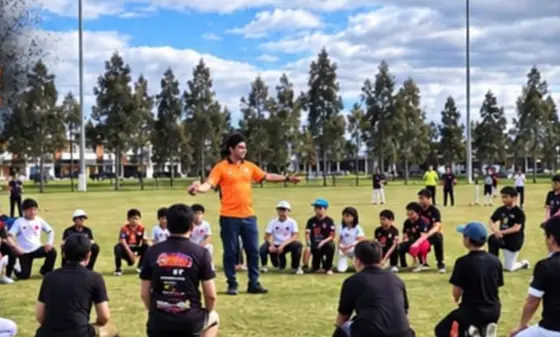 A coach with Aintree juniors at pre-season training, September 2026