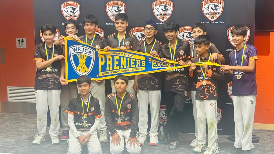 Aintree's unbeaten Under 13 Wednesday premiers with the WRJCA pennant